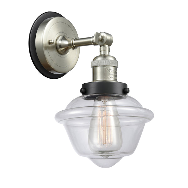 Oxford Sconce shown in the Brushed Satin Nickel finish with a Clear shade