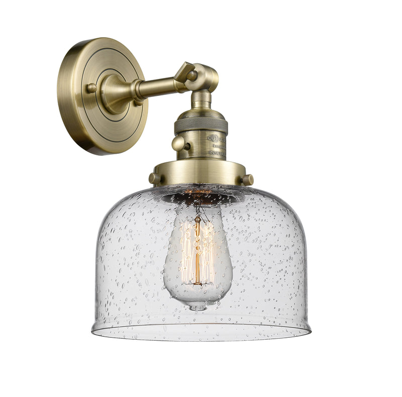 Innovations Lighting Large Bell 1-100 watt 8 inch Antique Brass Sconce  Seedy glass   180 Degree Adjustable Swivel High-Low-Off Switch 203SWABG74