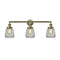 Chatham Bath Vanity Light shown in the Antique Brass finish with a Clear shade