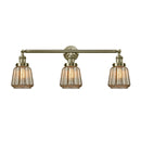 Chatham Bath Vanity Light shown in the Antique Brass finish with a Mercury shade