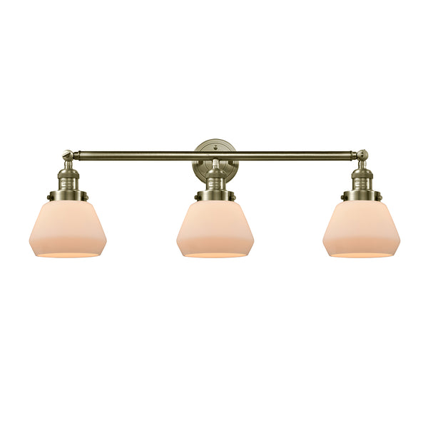 Fulton Bath Vanity Light shown in the Antique Brass finish with a Matte White shade