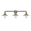 Halophane Bath Vanity Light shown in the Antique Brass finish with a Clear Halophane shade