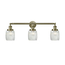 Colton Bath Vanity Light shown in the Antique Brass finish with a Clear Halophane shade