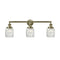Colton Bath Vanity Light shown in the Antique Brass finish with a Clear Halophane shade