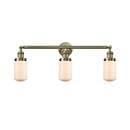 Dover Bath Vanity Light shown in the Antique Brass finish with a Matte White shade