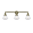 Olean Bath Vanity Light shown in the Antique Brass finish with a Clear shade