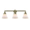 Cone Bath Vanity Light shown in the Antique Brass finish with a Matte White shade