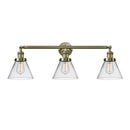 Cone Bath Vanity Light shown in the Antique Brass finish with a Clear shade