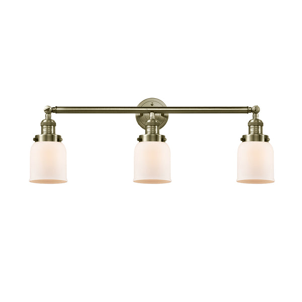 Bell Bath Vanity Light shown in the Antique Brass finish with a Matte White shade