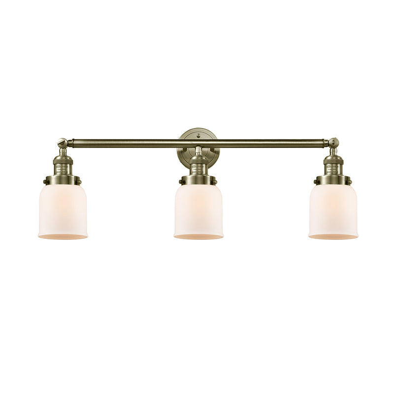 Bell Bath Vanity Light shown in the Antique Brass finish with a Matte White shade