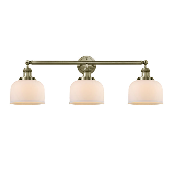 Bell Bath Vanity Light shown in the Antique Brass finish with a Matte White shade