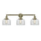 Bell Bath Vanity Light shown in the Antique Brass finish with a Clear shade