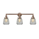Chatham Bath Vanity Light shown in the Antique Copper finish with a Clear shade