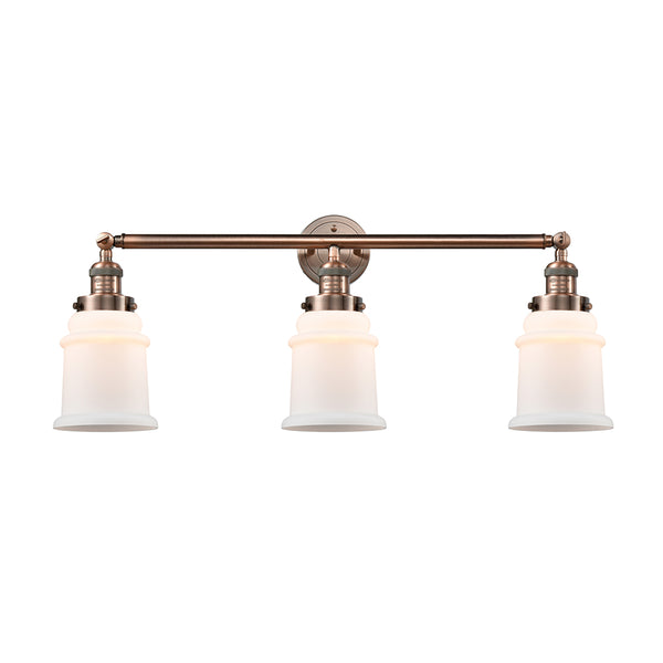 Canton Bath Vanity Light shown in the Antique Copper finish with a Matte White shade