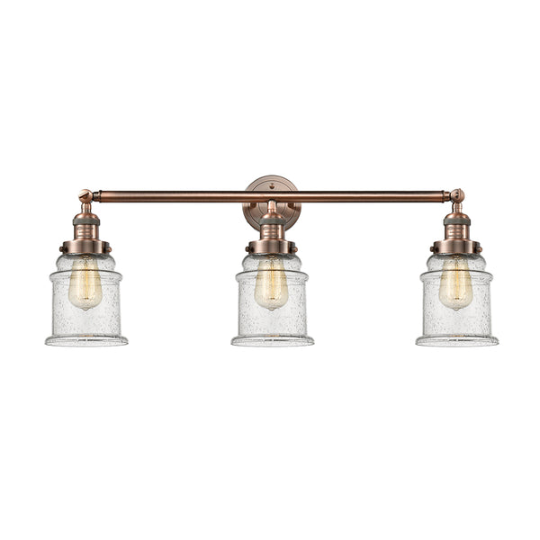 Canton Bath Vanity Light shown in the Antique Copper finish with a Seedy shade