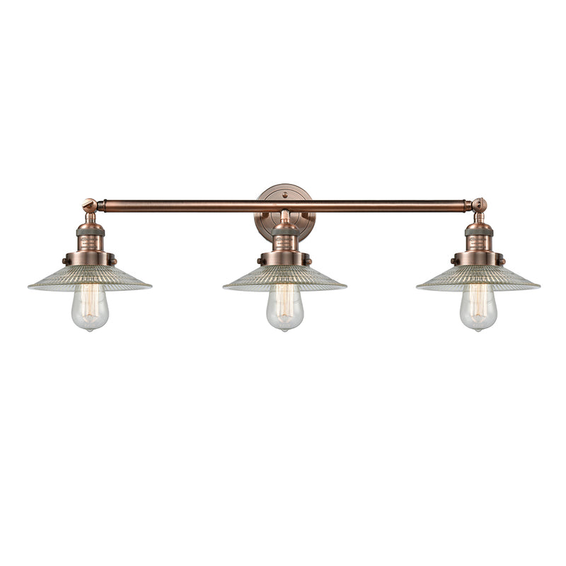 Halophane Bath Vanity Light shown in the Antique Copper finish with a Clear Halophane shade