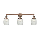 Colton Bath Vanity Light shown in the Antique Copper finish with a Clear Halophane shade