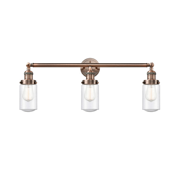 Dover Bath Vanity Light shown in the Antique Copper finish with a Seedy shade