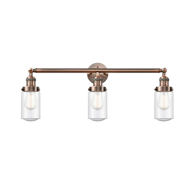 Dover Bath Vanity Light shown in the Antique Copper finish with a Seedy shade