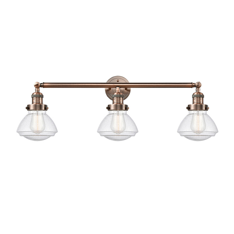 Olean Bath Vanity Light shown in the Antique Copper finish with a Seedy shade