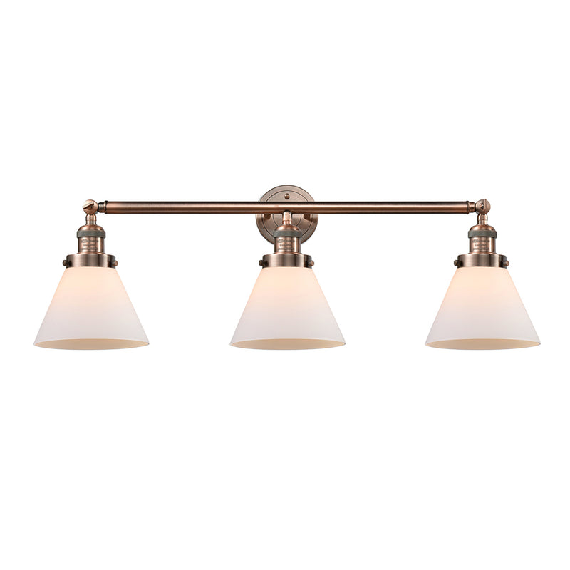 Cone Bath Vanity Light shown in the Antique Copper finish with a Matte White shade