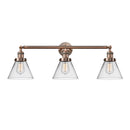 Cone Bath Vanity Light shown in the Antique Copper finish with a Clear shade