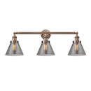 Cone Bath Vanity Light shown in the Antique Copper finish with a Plated Smoke shade