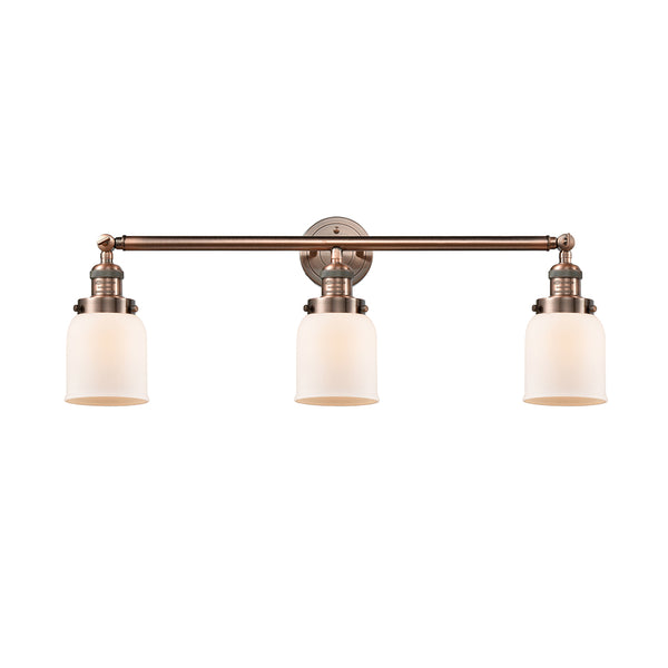 Bell Bath Vanity Light shown in the Antique Copper finish with a Matte White shade