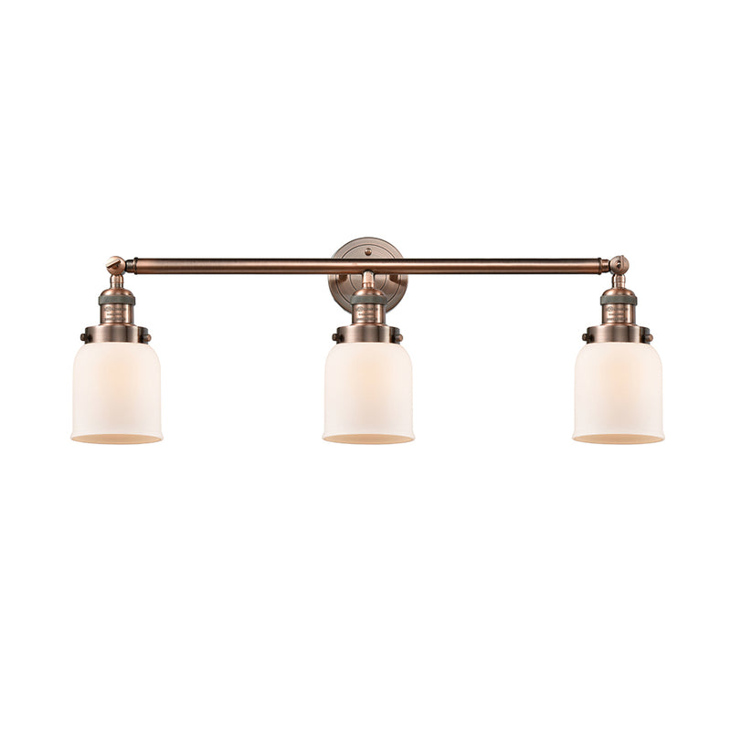 Bell Bath Vanity Light shown in the Antique Copper finish with a Matte White shade