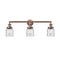 Bell Bath Vanity Light shown in the Antique Copper finish with a Clear shade