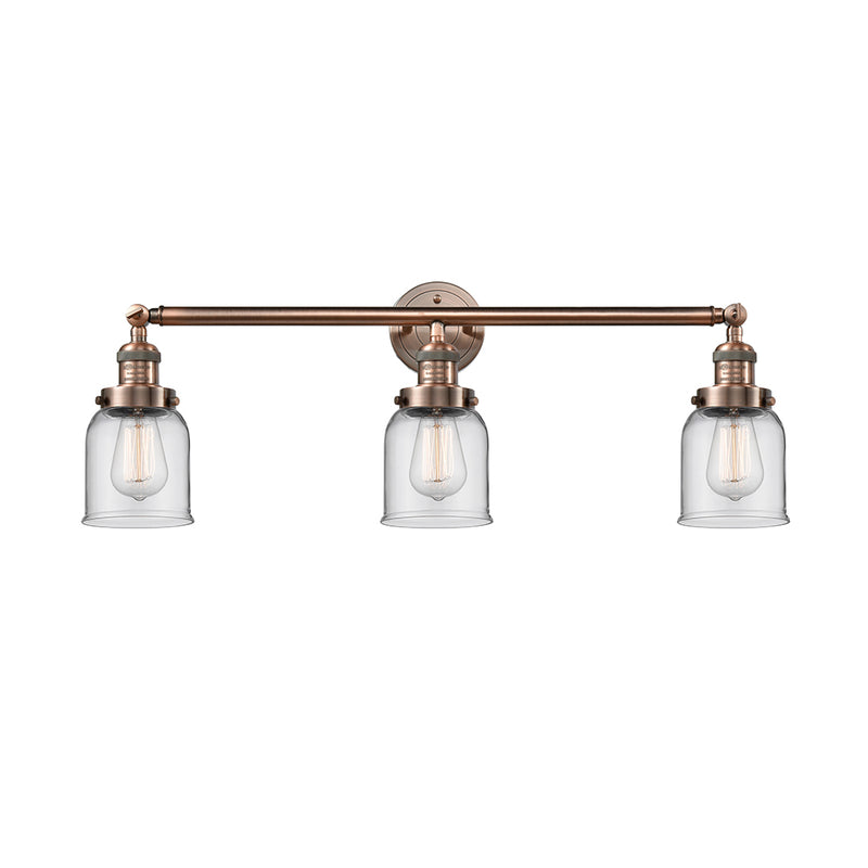 Bell Bath Vanity Light shown in the Antique Copper finish with a Clear shade
