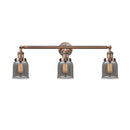 Bell Bath Vanity Light shown in the Antique Copper finish with a Plated Smoke shade