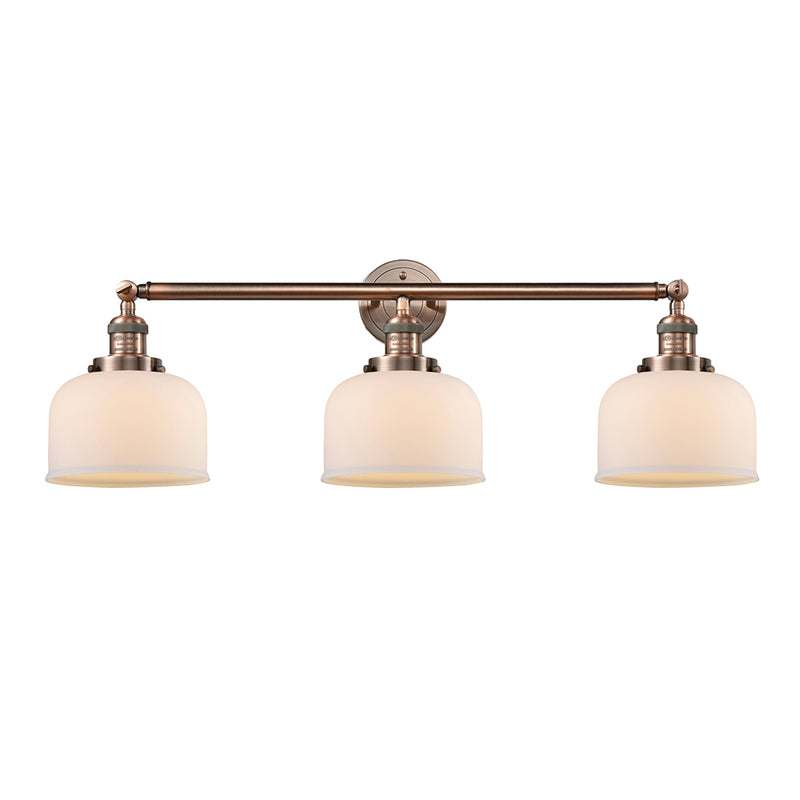Bell Bath Vanity Light shown in the Antique Copper finish with a Matte White shade