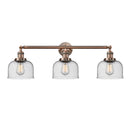 Bell Bath Vanity Light shown in the Antique Copper finish with a Seedy shade