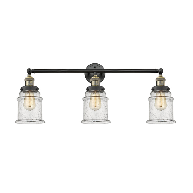Canton Bath Vanity Light shown in the Black Antique Brass finish with a Seedy shade