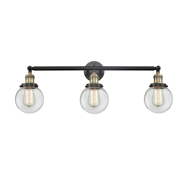 Beacon Bath Vanity Light shown in the Black Antique Brass finish with a Clear shade