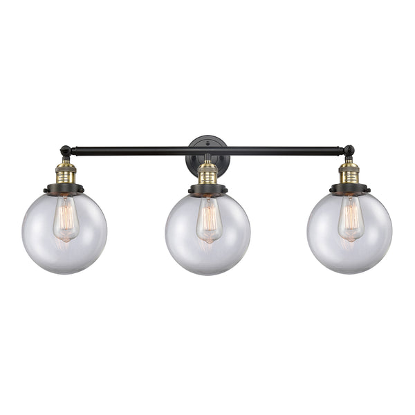 Beacon Bath Vanity Light shown in the Black Antique Brass finish with a Clear shade