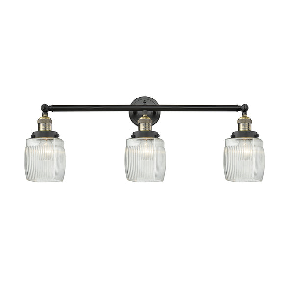 Colton Bath Vanity Light shown in the Black Antique Brass finish with a Clear Halophane shade
