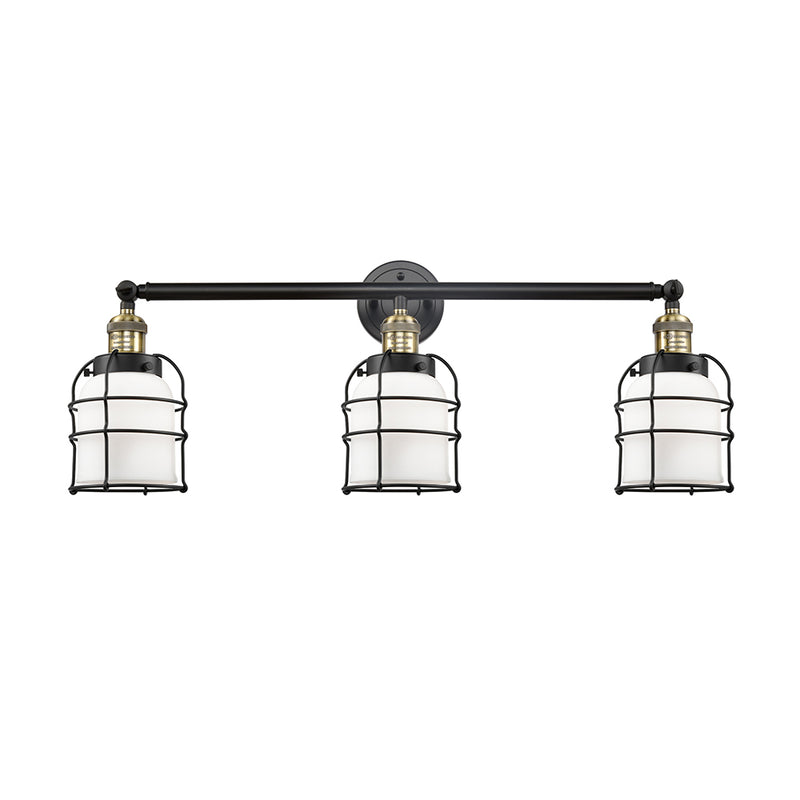 Bell Cage Bath Vanity Light shown in the Black Antique Brass finish with a Matte White shade