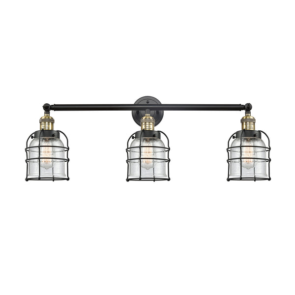 Bell Cage Bath Vanity Light shown in the Black Antique Brass finish with a Seedy shade