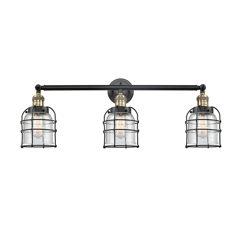 Bell Cage Bath Vanity Light shown in the Black Antique Brass finish with a Seedy shade