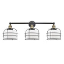 Bell Cage Bath Vanity Light shown in the Black Antique Brass finish with a Matte White shade