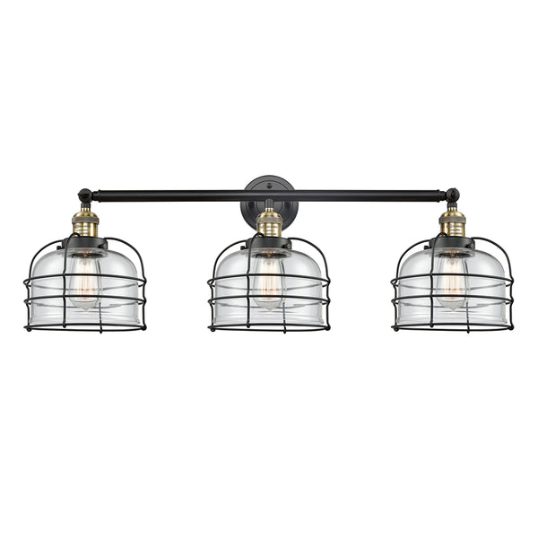 Bell Cage Bath Vanity Light shown in the Black Antique Brass finish with a Clear shade