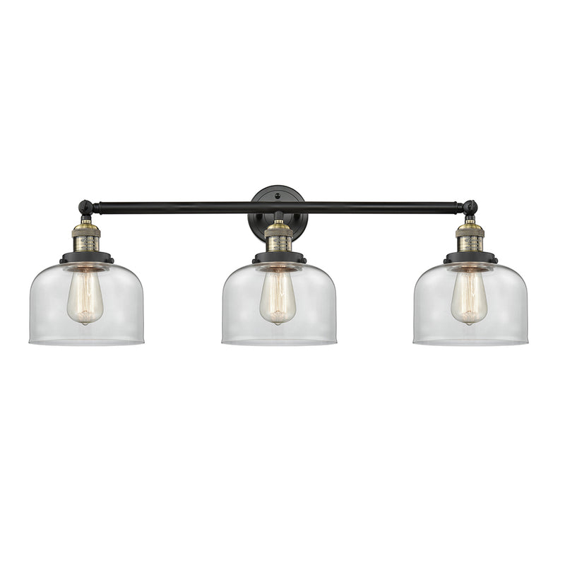 Bell Bath Vanity Light shown in the Black Antique Brass finish with a Clear shade