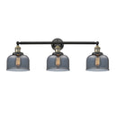Bell Bath Vanity Light shown in the Black Antique Brass finish with a Plated Smoke shade