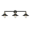 Railroad Bath Vanity Light shown in the Black Antique Brass finish with a Matte Black shade