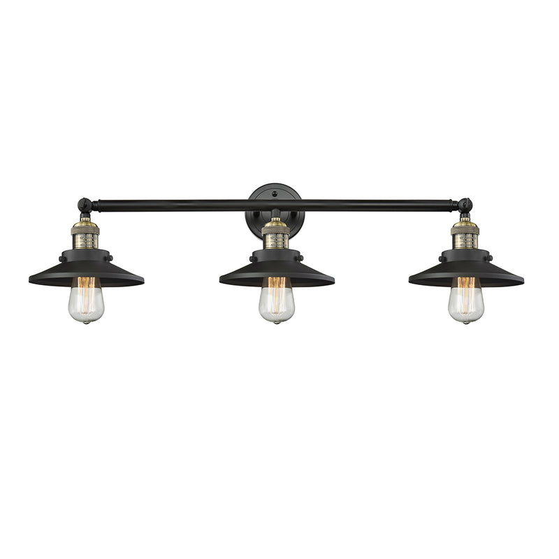 Railroad Bath Vanity Light shown in the Black Antique Brass finish with a Matte Black shade