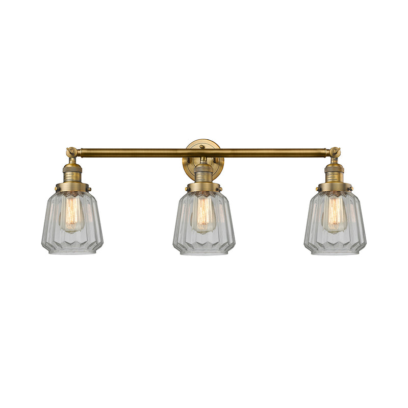 Chatham Bath Vanity Light shown in the Brushed Brass finish with a Clear shade