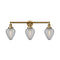 Geneseo Bath Vanity Light shown in the Brushed Brass finish with a Clear Crackled shade