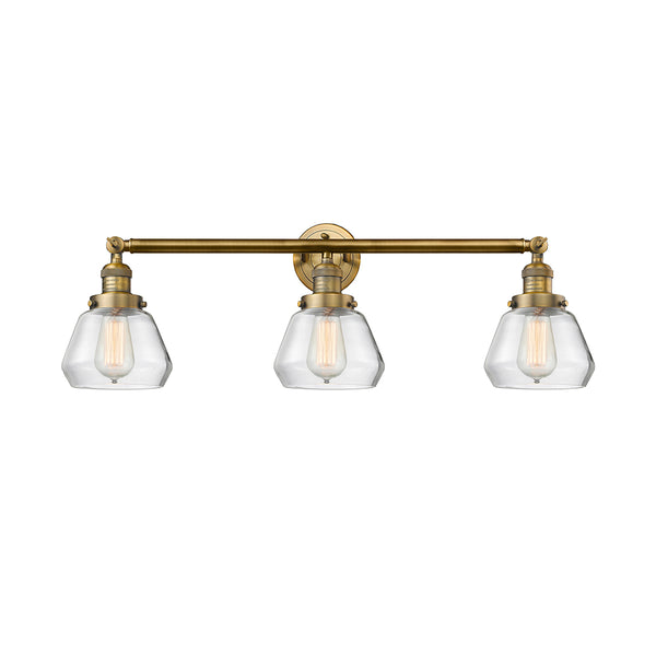 Fulton Bath Vanity Light shown in the Brushed Brass finish with a Clear shade